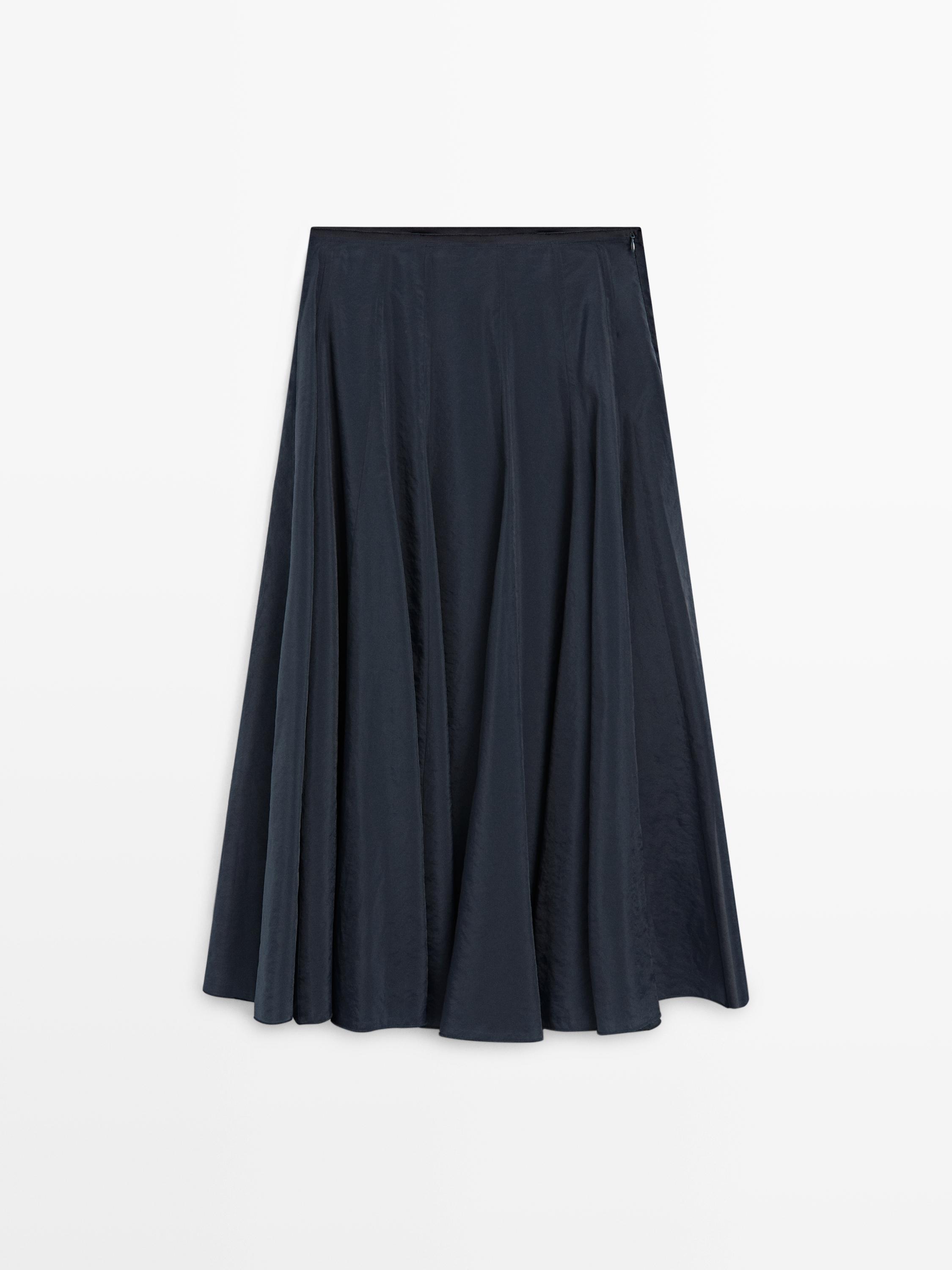 Jupe midi à plis nervurés